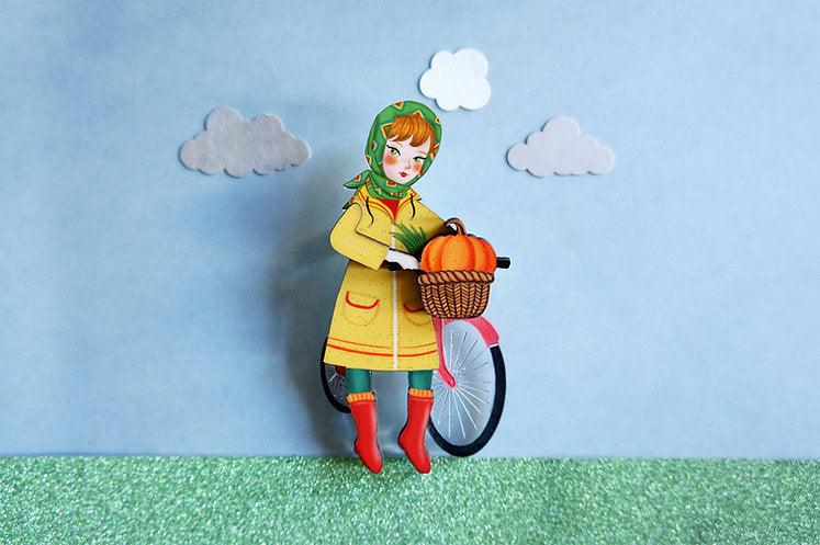 Girl with bicycle brooch by Laliblue